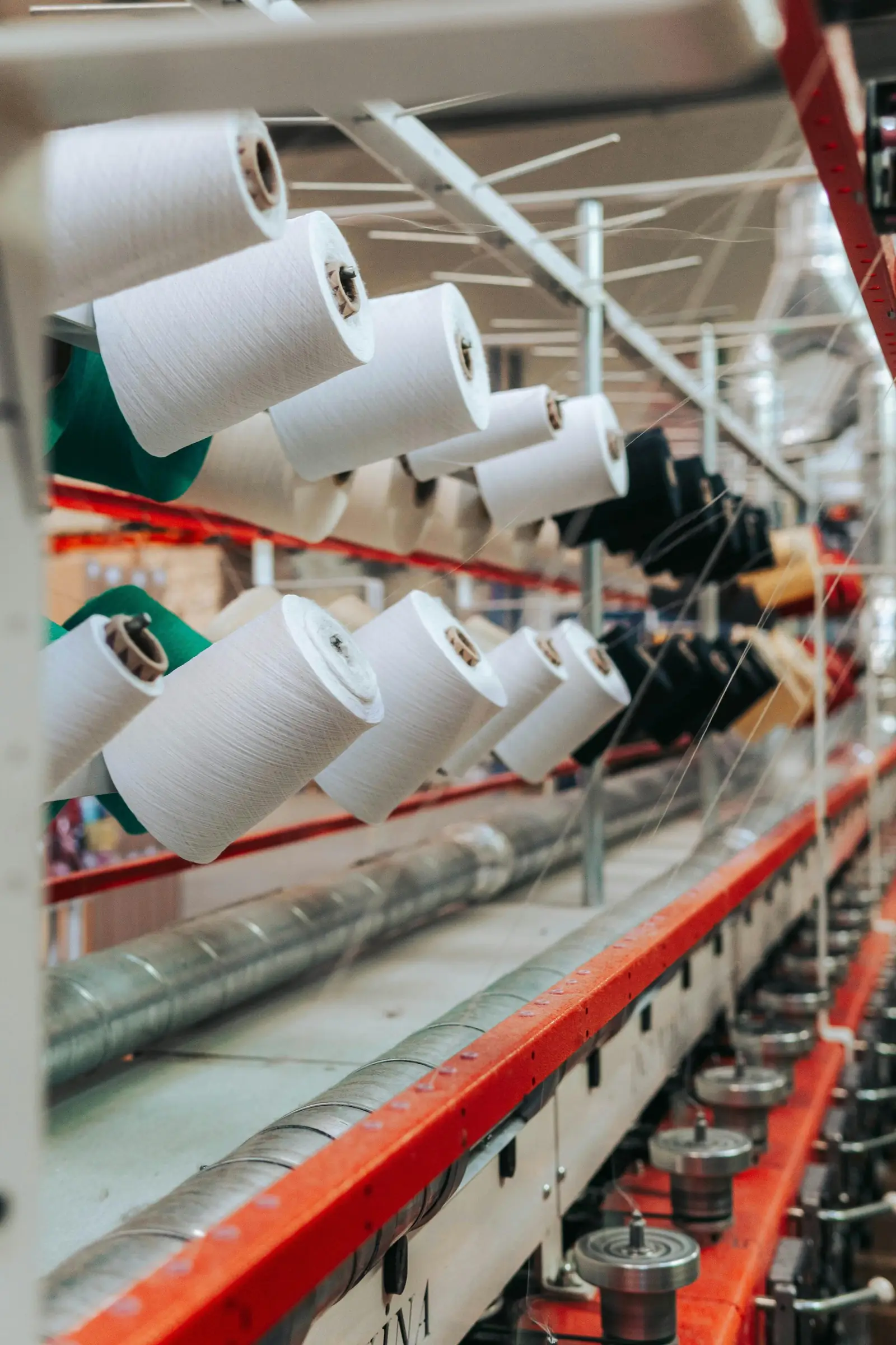 Yarn bobbins on a rack